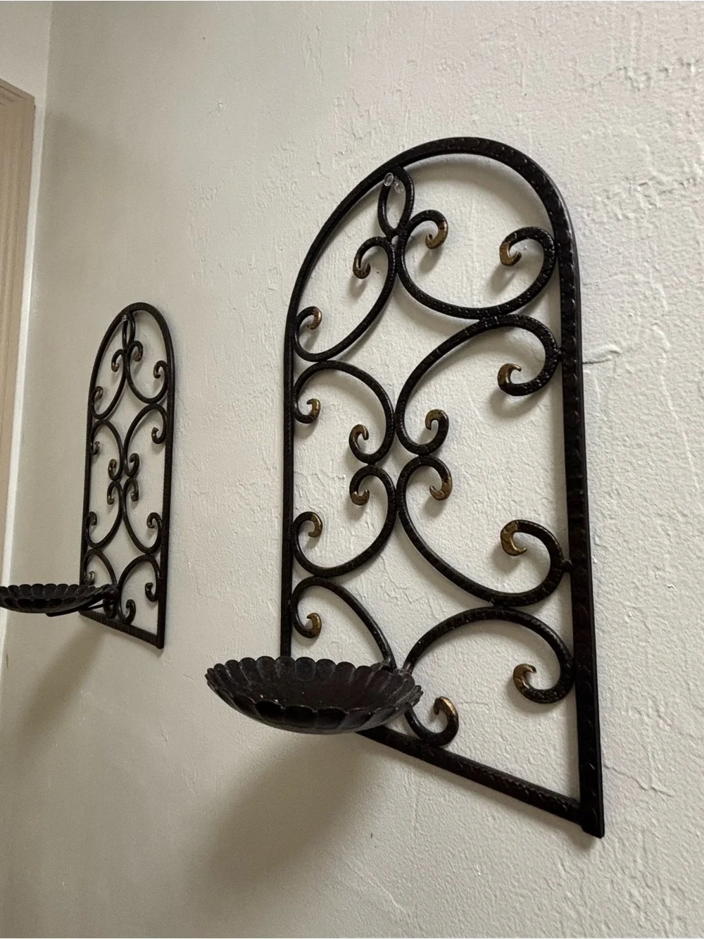 Two vintage iron scroll wall sconce candle holders